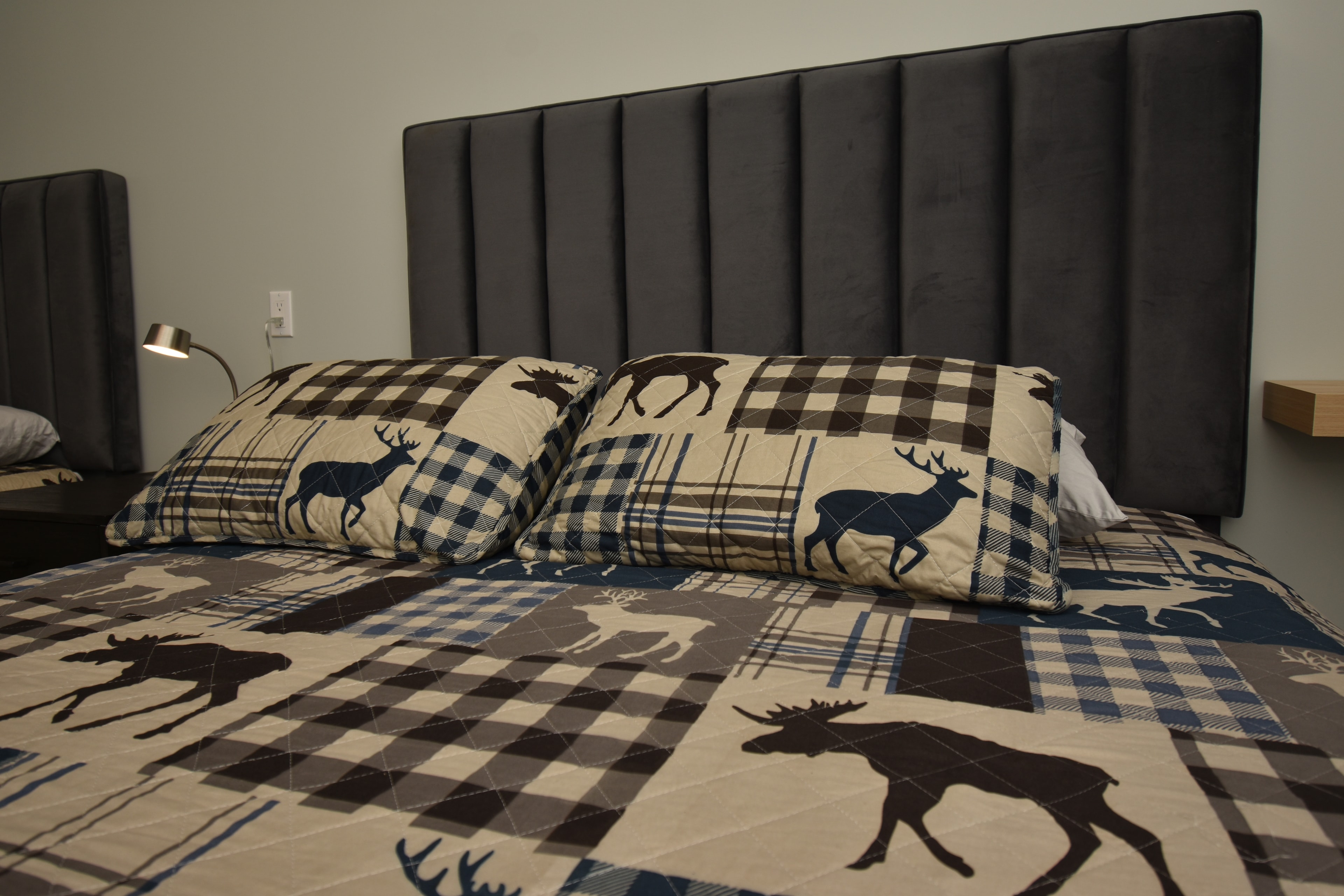 Cozy double-queen lodge room at Moosehead